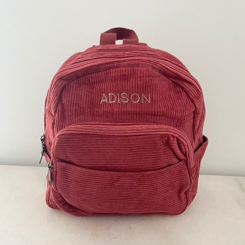 red bag with mauve thread